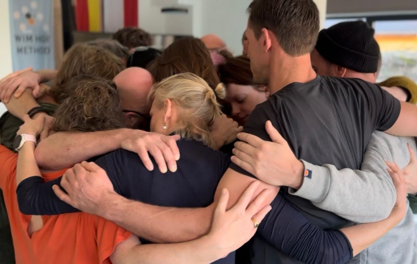 Group embrace after a workshop
